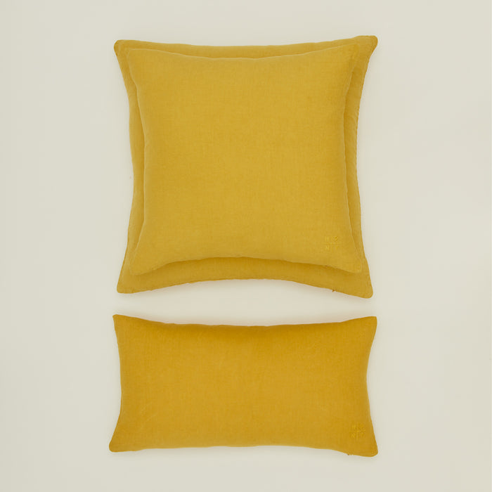 Simple linen pillow in mustard