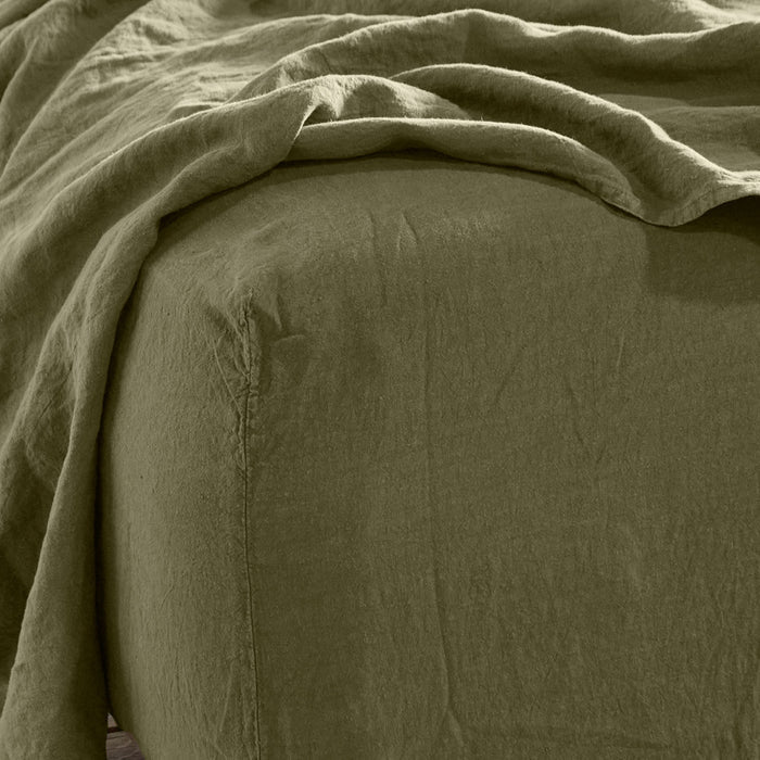 Simple linen bedding in olive