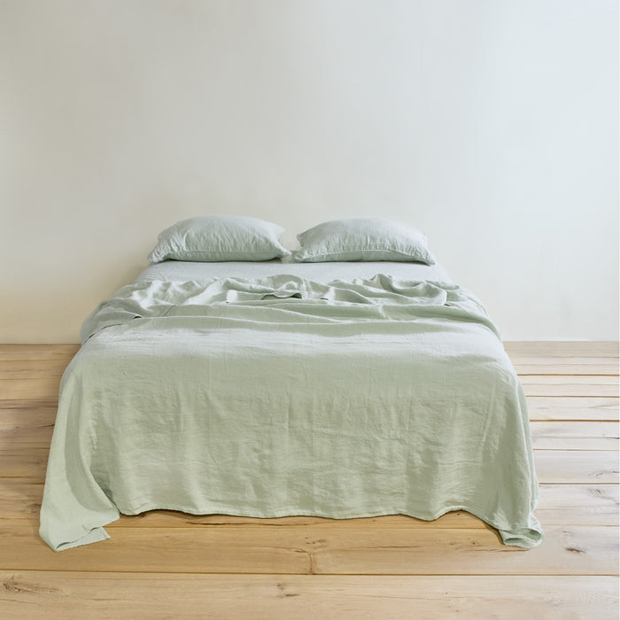 Simple linen bedding in sage