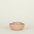 Three Simple Marble Bowls in various sizes in Pink, nested.