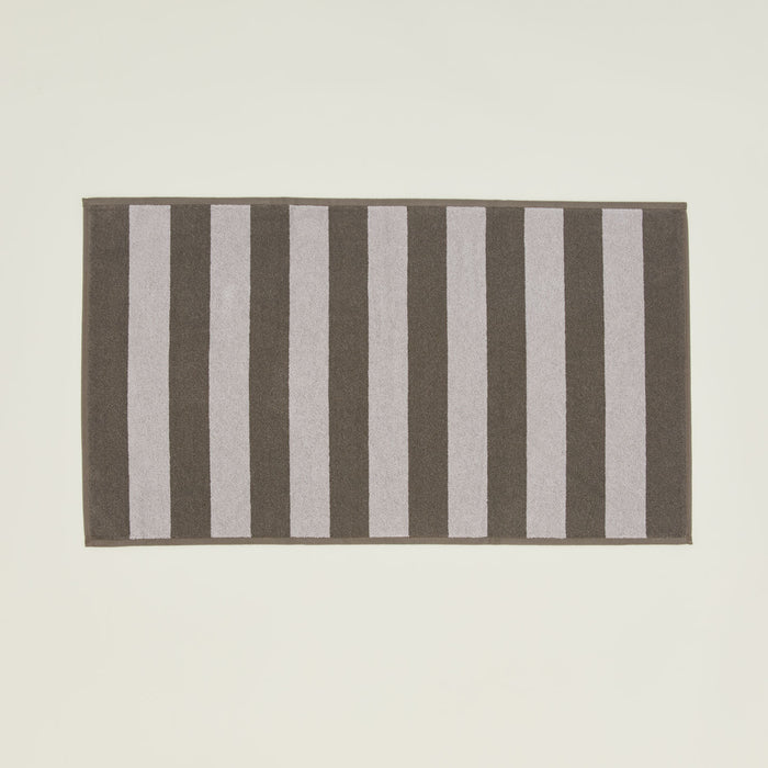 Simple Striped Terry Bath Mat in light grey and dark grey.