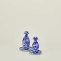 Large and small splatter candle stick holders in sky and cobalt