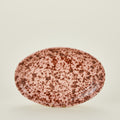 Splatterware serving platter in blush and terracotta