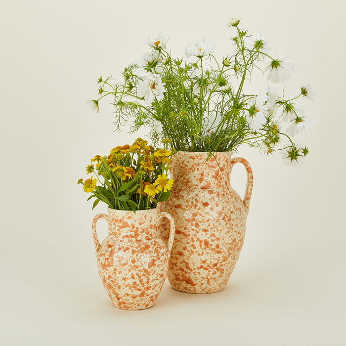 Large and small splatterware vases in ivory and bronze with florals