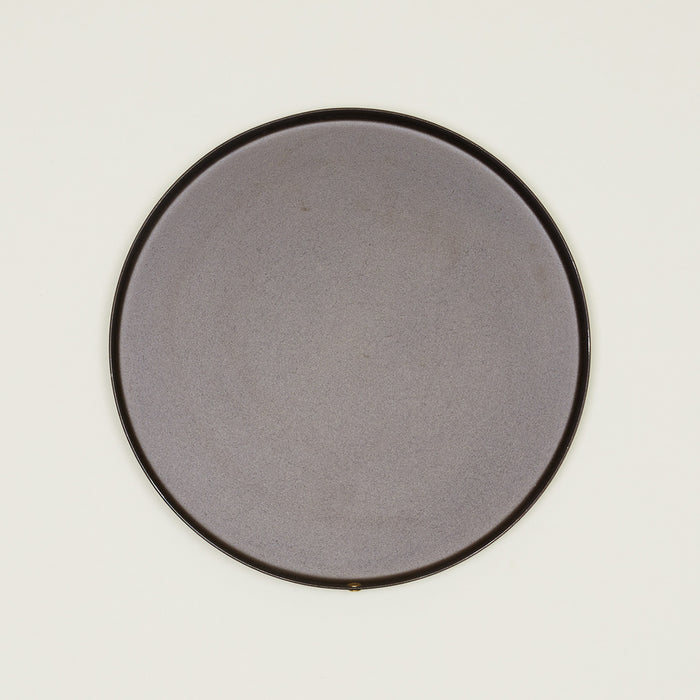 Overhead view spun iron cake pan