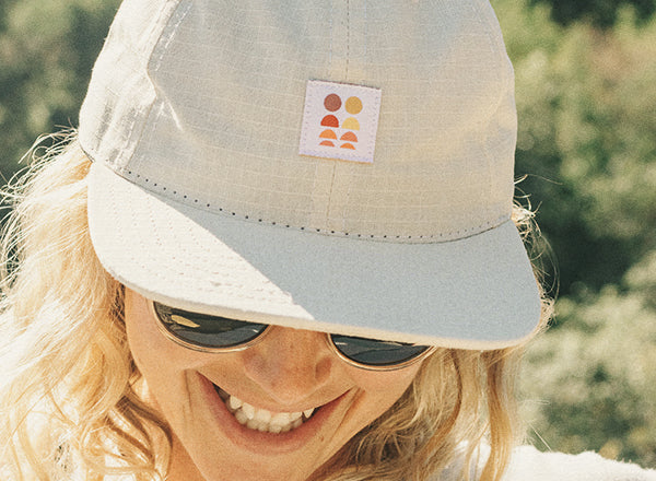 RICH close up of sunski sun up hat graphic