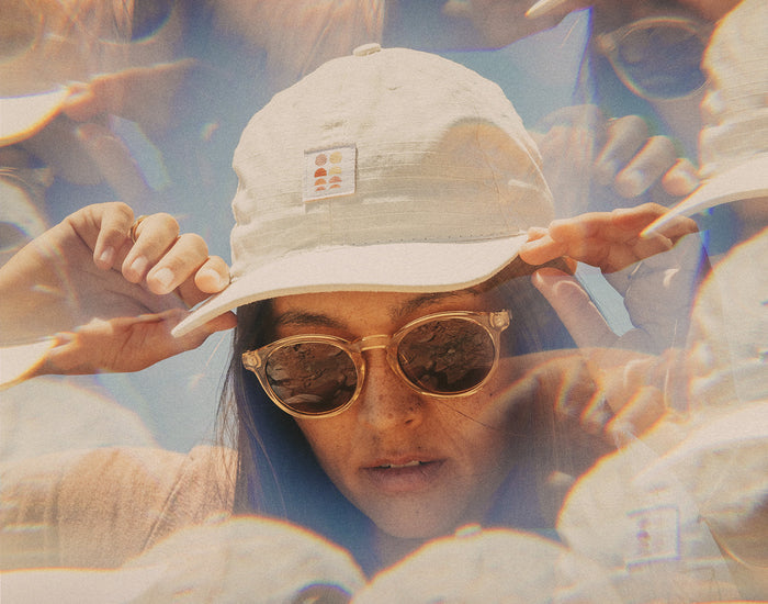 STORY kaleidoscope image of girl wearing sunski sun up hat