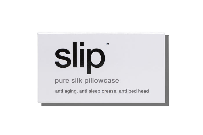 White slip silk king pillowcase branded packaging on a white background.
