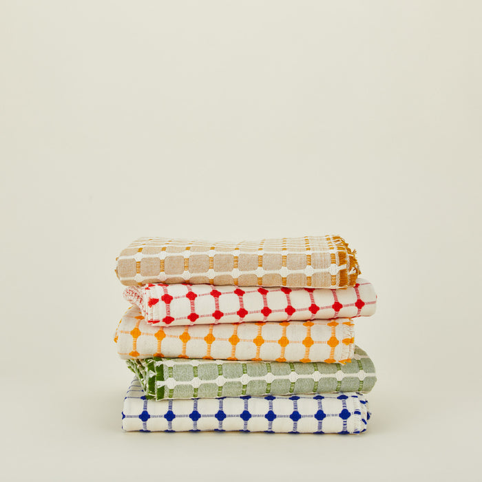 Dove and Donkey wicker fringed tablecloths in various colors