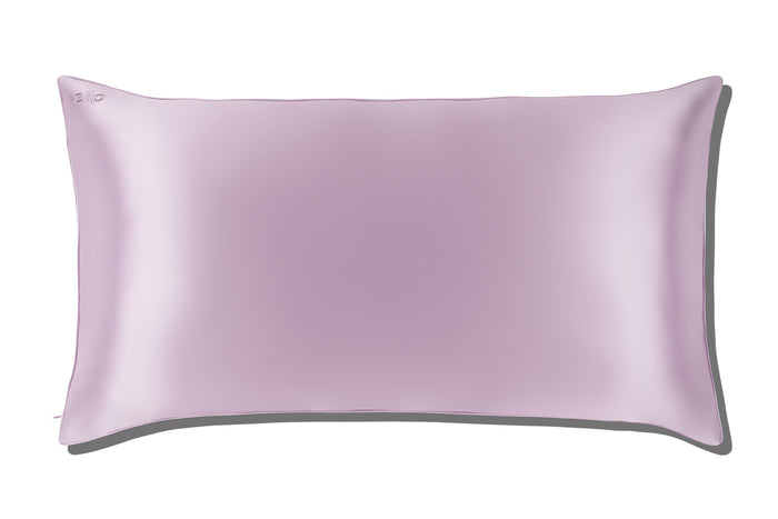 A lilac slip silk king pillowcase on a white background.