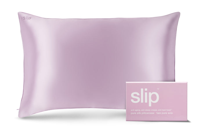 A lilac slip silk queen pillowcase with branded packaging on a white background.