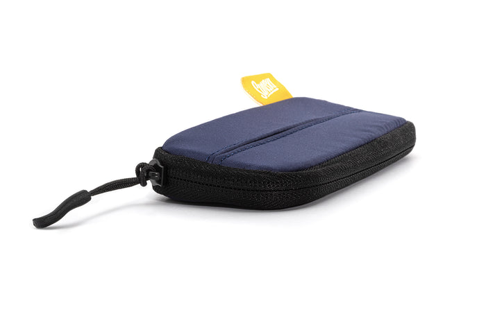 PROD_ACC_CA_ALP sunski zipper case navy laying down three quarter angle